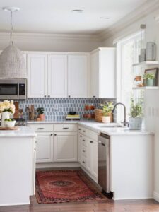 A kitchen painted in light colors