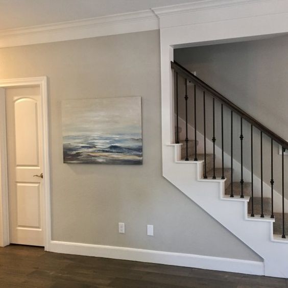 An entryway painted Agreeable Gray by Sherwin-Williams