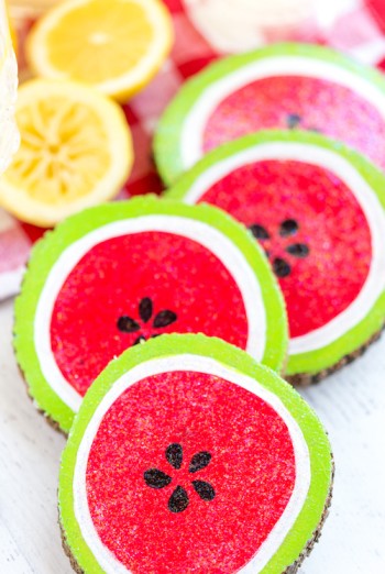 DIY Watermelon Coasters scatted beside lemons