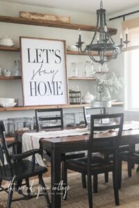 Let’s Stay Home summer decor sign in a dining room