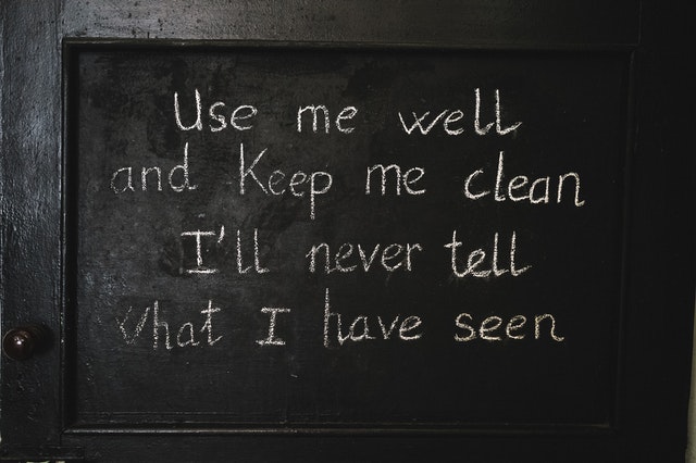 A blackboard with the following quote on it: Use me well and keep me clean, I’ll never tell what I have seen